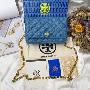 Tory Burch ladies blue shoulder bag with gold chain is fashionable and easy to m